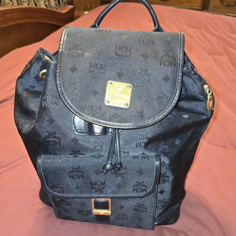MCM Black Backpack with Gold Accents